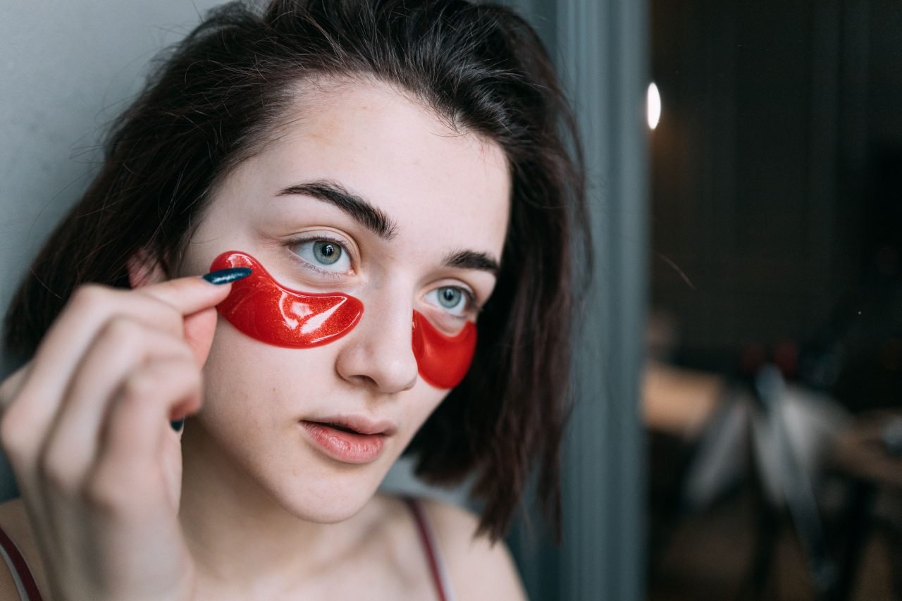 Applying a clear hydrogel patch to skin as part of a skincare routine