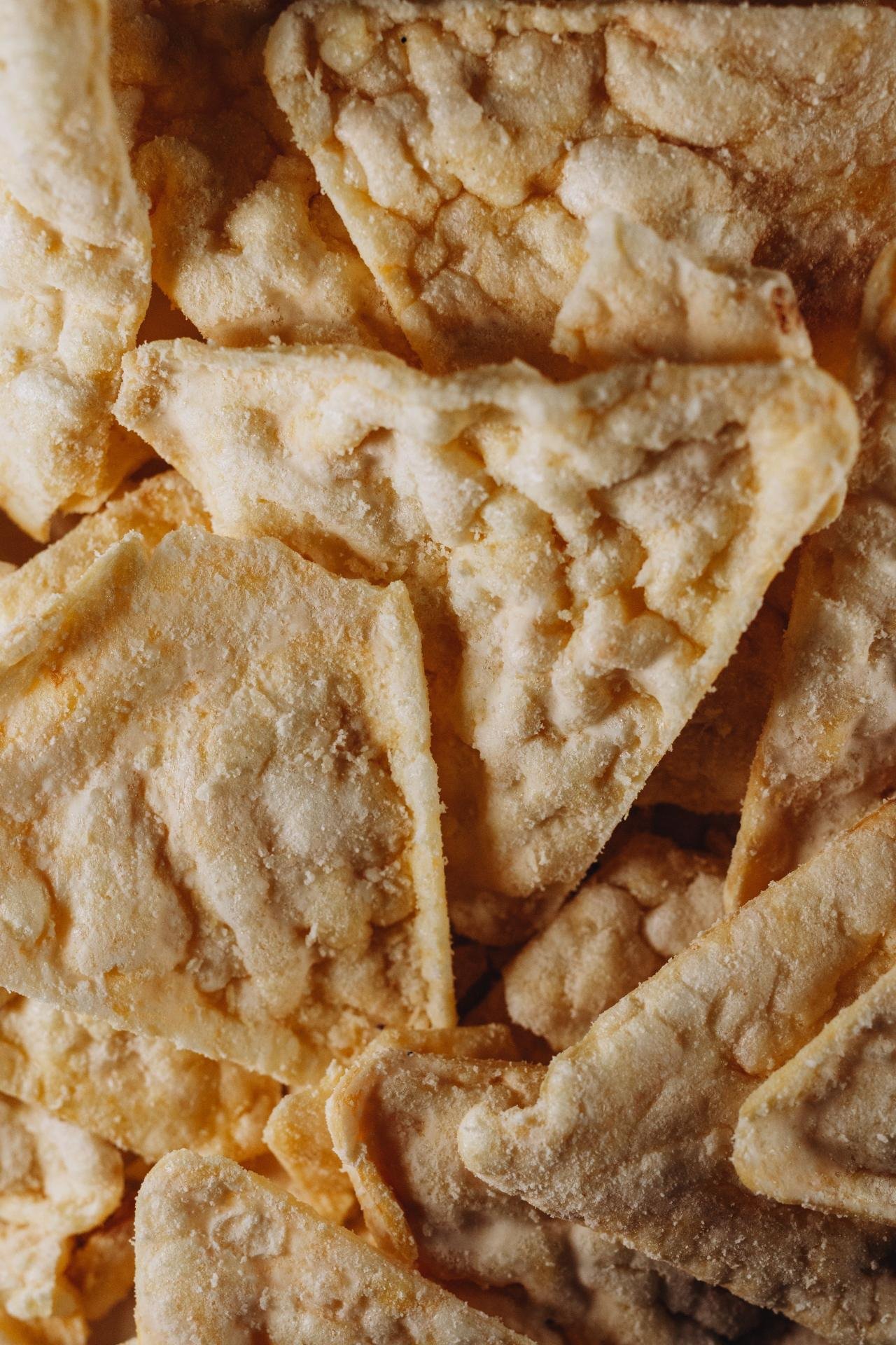 close-up of colorful orange tortilla chips texture