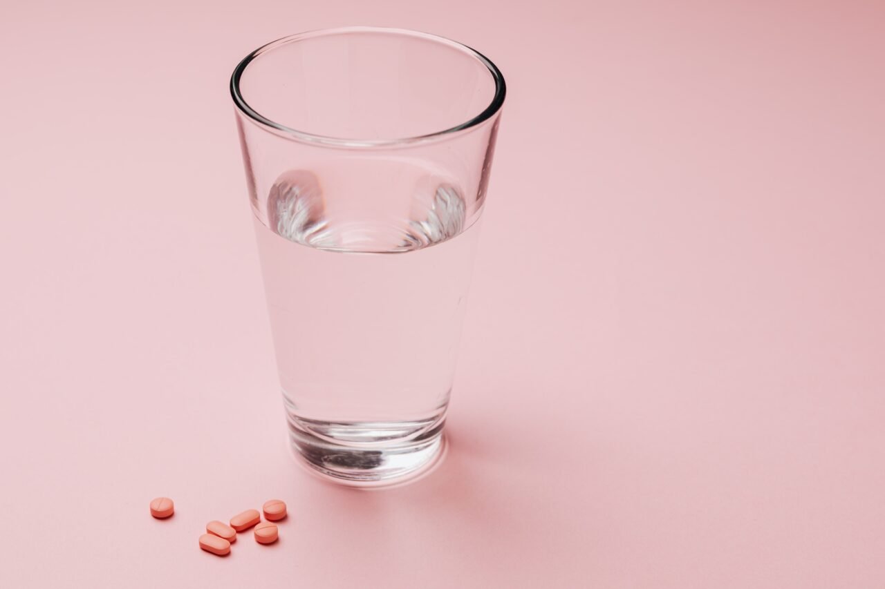 glass of water with vitamins