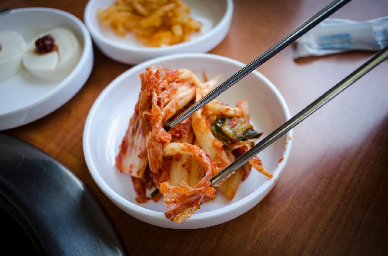 close-up of kimchi showing napa cabbage and Korean red pepper coating