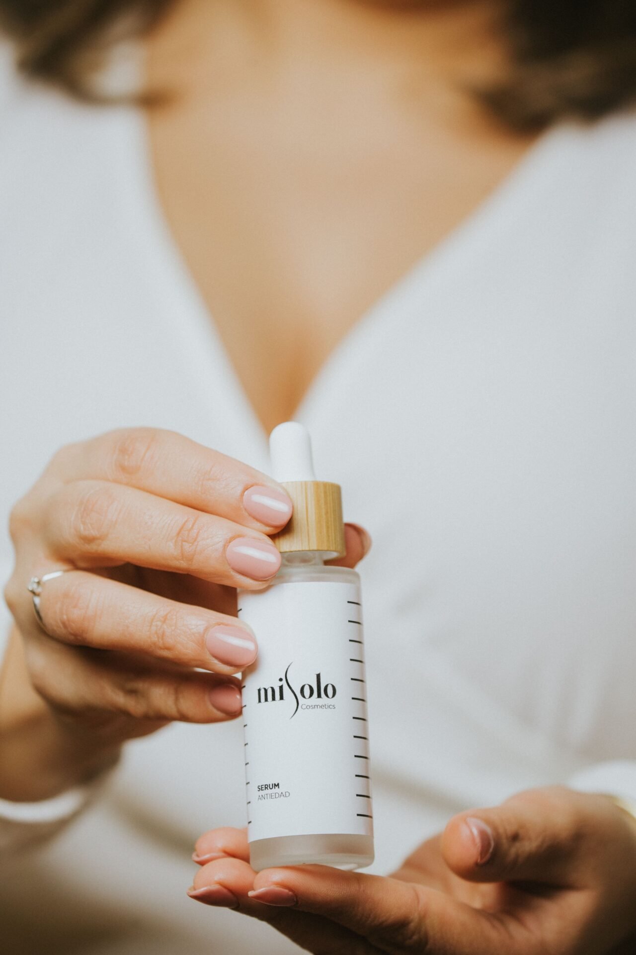 close-up of reading a cosmetic product label