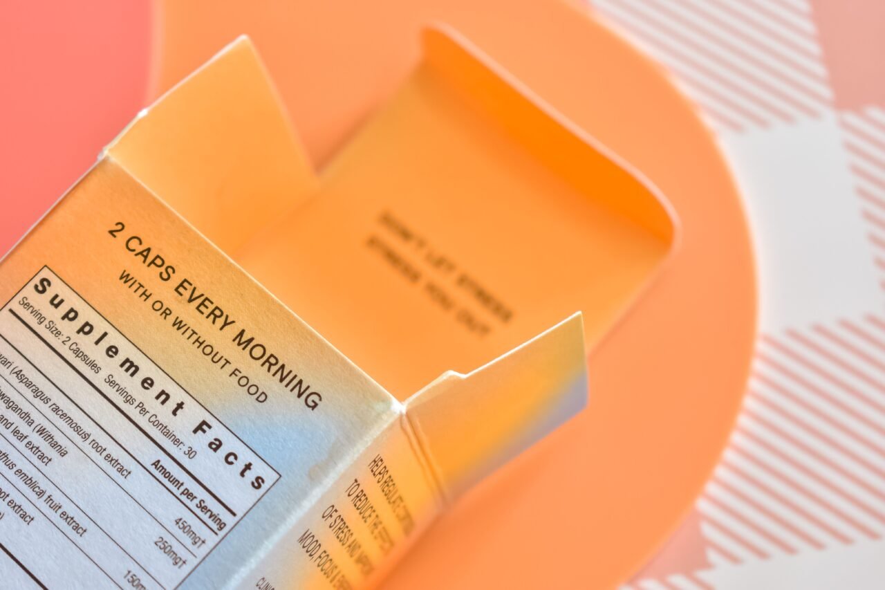 close-up of reading a supplement facts label